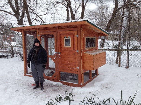 Jilli in front of the recently completed chicken coop.